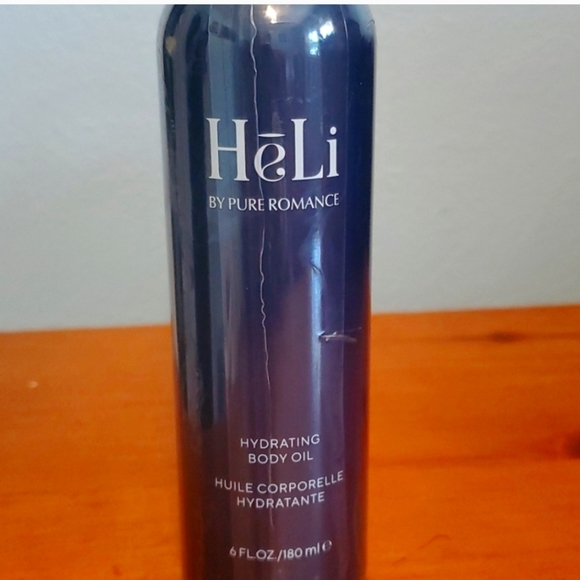 🤩HP🥳 NWOT- Sealed in packaging 📦  Heli Hydrating Body Oil Spray, 6fl oz 💙 - Picture 2 of 3